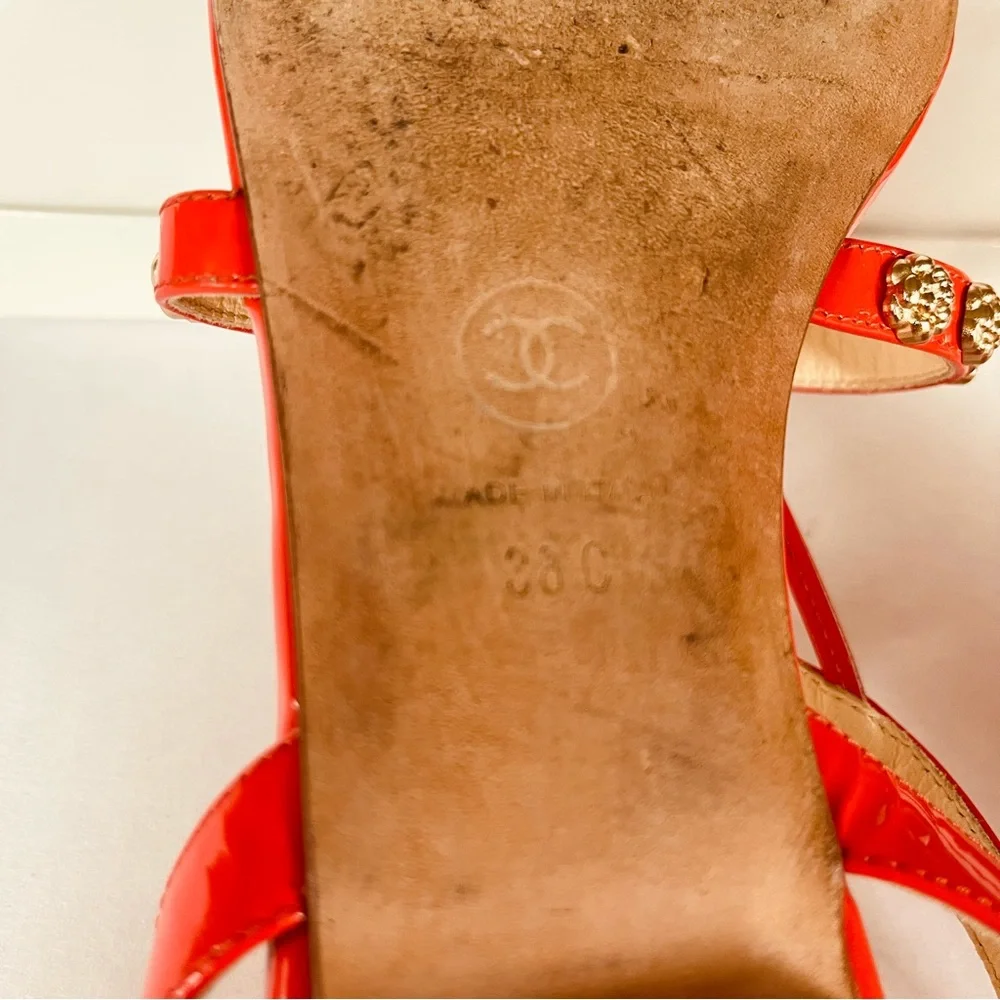 CHANEL coral red gold camellia studded flat sandals 38